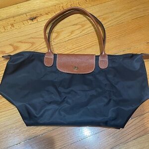 Long voyage bag 
Condition : Used 
Color : Black